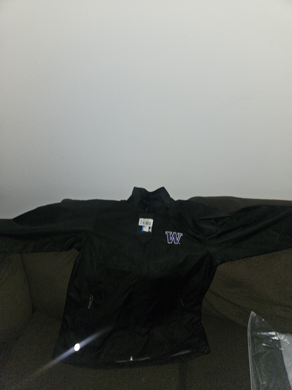 Storm Black Womans Windbreaker Jacket with Purple 'W' Chest Logo